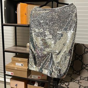 Brand New Silver Sequin skirt. Silver Metallic. Brand new. Never worn. High end